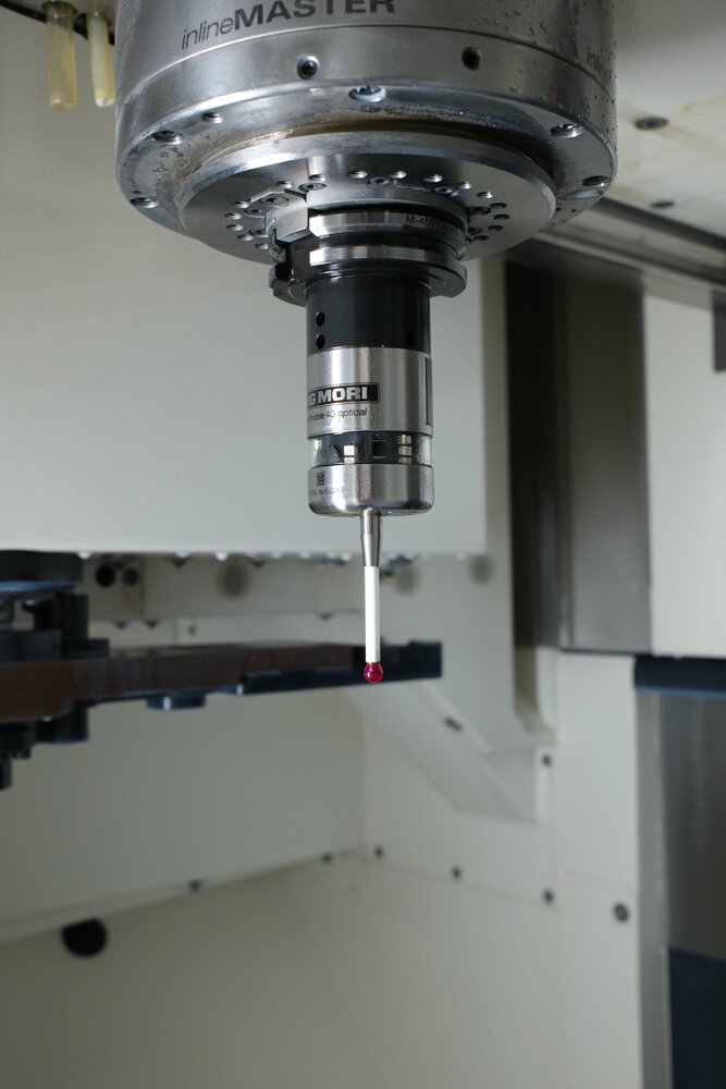 Touch probe in the spindle of a machining centre at CAD-IS